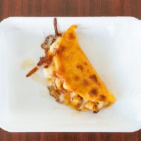 Shrimp Queso Taco · Single corn tortilla, marinated shrimp, mozzarella cheese.