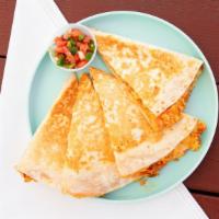 Egg & Cheese Quesadilla · Scrambled eggs with our house made seasoning in case in cheese with Louisiana hot sauce in a...