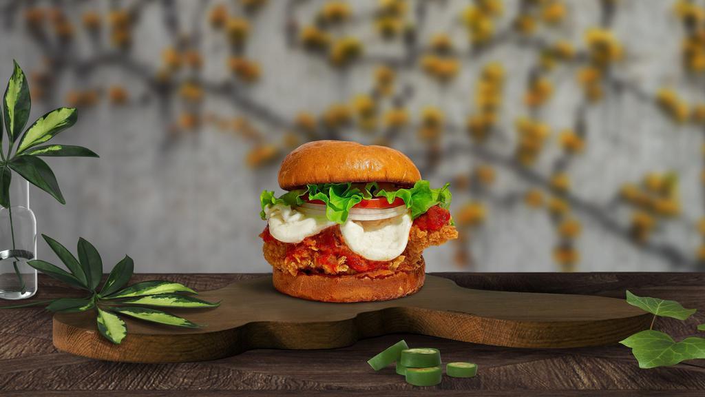 Love Is Chicken, Love Is Parm Sandwich  · Crispy fried chicken chicken topped with mozzarella cheese and fresh house marinara sauce. Served on a warm bun.