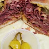 Pastrami Sandwich · Smoked and cured beef sandwich.