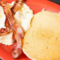 Pancake Combo · One egg, choice of ham, bacon or sausage.
