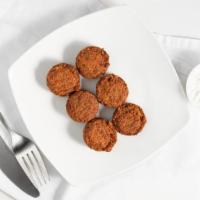 Falafel Side · A serving of six deep fried dough balls made with mashed chickpeas, olive oil, and spices, w...