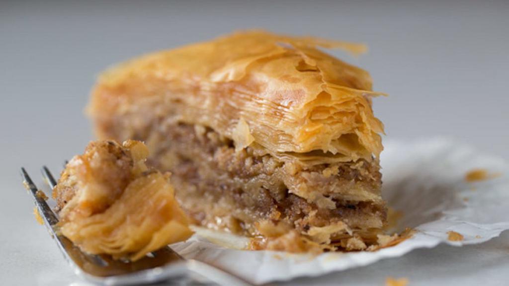 Baklava · A crisp, flakey Greek pastry triangle made with walnuts and drenched in honey.