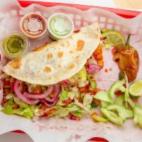 Shrimp Quesadilla · Flour tortilla, mozzarella cheese, deep fried shrimp, topped with lettuce, pico and pickled ...