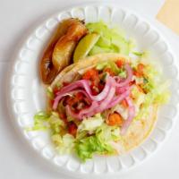 Shrimp Taco · Corn tortilla, deep fried shrimp, topped with lettuce, pico and pickled onions.