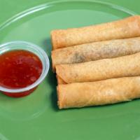 Fried Spring Rolls · Ground turkey, mushrooms, taro, glass noodle and carrot rolled in rice paper.