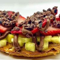 Lola Belle · Cookie Butter, pineapple, strawberry, cocoa nibs, Nutella on a toasted sourdough bread