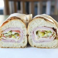 American Hero · Black Forest Ham, Genoa Salami, Mortadella, white American cheese, lettuce, tomato, onion, p...