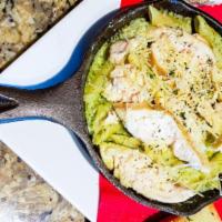 Creamy Pesto Penne · Penne tossed in our homemade pesto cream sauce topped mozzarella. Add chicken, sausage for a...