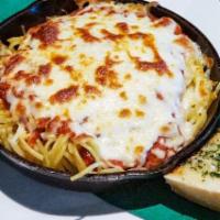 Baked Spaghetti · Spaghetti tossed in homemade meat sauce and baked with mozzarella. Add meatball for an addit...