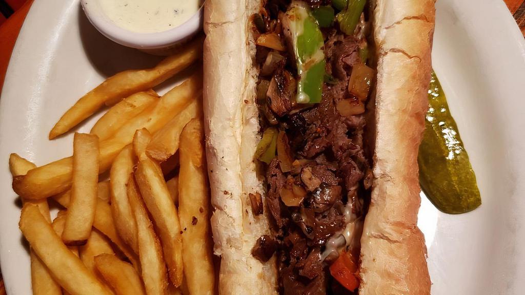 Esposito'S Famous Philly Cheesesteak · Thinly shaved Sirloin, smothered with white American cheese, loaded with mushrooms, bell peppers, and onions. Served on a 12