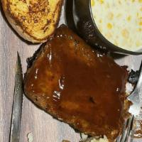Bbq Glazed Meatloaf  Dinner · Our homemade meatloaf glazed with a sweet and spicy BBQ sauce. Served with mashed potatoes, ...
