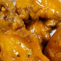 Chicken Wings Appetizer · BBQ, Buffalo, House with Bleu Cheese or Ranch.