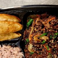 Spicy Pork+Pork Potsticker Dinner Box · Spicy pork, 6pcs potsticker, steamed rice