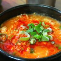 Soft Tofu Soup · Soft tofu soup with egg and choice of seafood, pork, beef.
