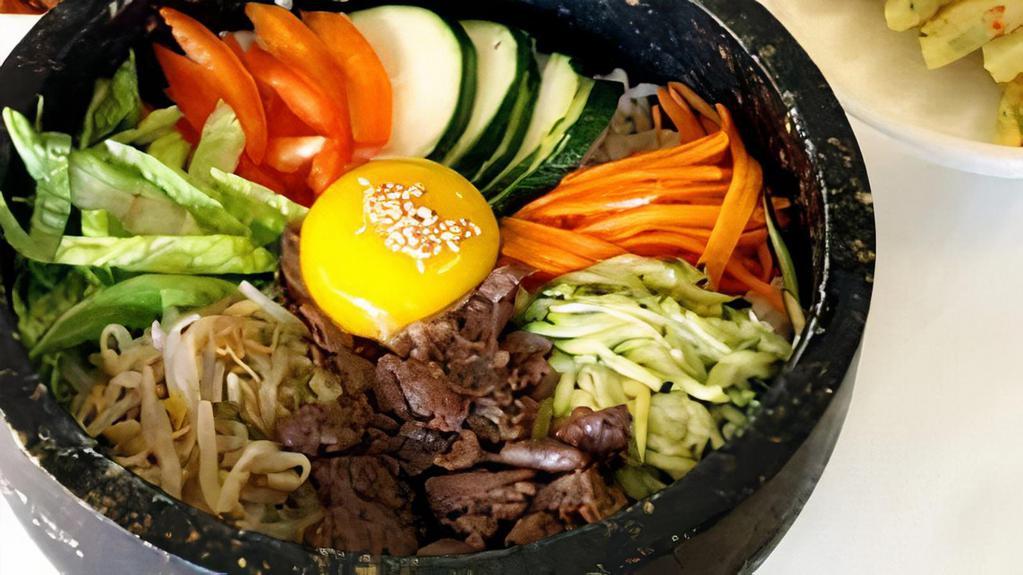 Bibimbap With Beef · Assorted veggies, beef, rice and egg. Comes with steamed rice and side dishes
