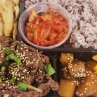 Korea House Bbq Beef Dinner Box  · Marinated beef, assorted side dishes(Potato, pickled radish, fish cake, kimchi), steamed ric...