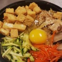Tofu Bibimbop Vegetarian · Fried tofu, carrots, zucchini, mushroom, beansprout. Comes with steamed rice and side dishes