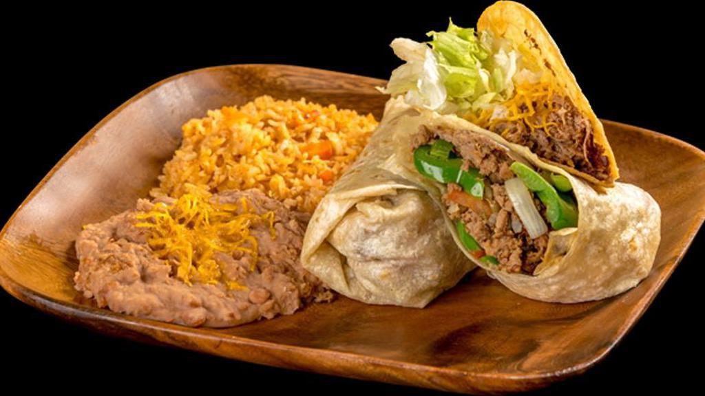 Burrito And Taco · Burrito: shredded beef with bell peppers, tomatoes, and onion. Taco: shredded beef taco with cheese and lettuce. served with beans and rice.