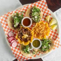 4 Street Tacos · Two small soft layered corn tortillas filled with your choice of meat (asada, chorizo, pasto...
