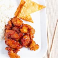 New Orange Chicken · Marinated chicken breast, breaded, deep-fried, and tossed with homemade orange sauce. Served...