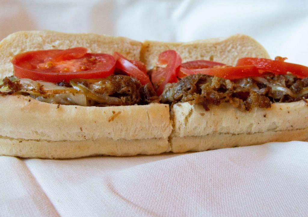 Philly  · Provolone, American Cheese, Grilled Onions, Tomatoes & Mayo. Add Mushrooms for an additional price.