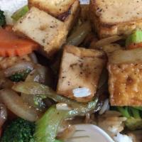 Black Pepper Garlic Stir-Fry · Stir-fry with choice of meat or tofu in peppery and garlicky sauce and steamed assorted vege...