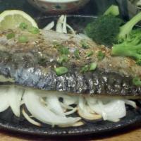 Saba Shioyaki · Broiled mackerel served in the sizzling iron pan.