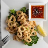 Salt & Pepper Calamari · Crispy fried calamari served with your choice of sauce.