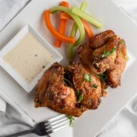 Chicken Wings · Braised and crispy fried with your choice of sauce.