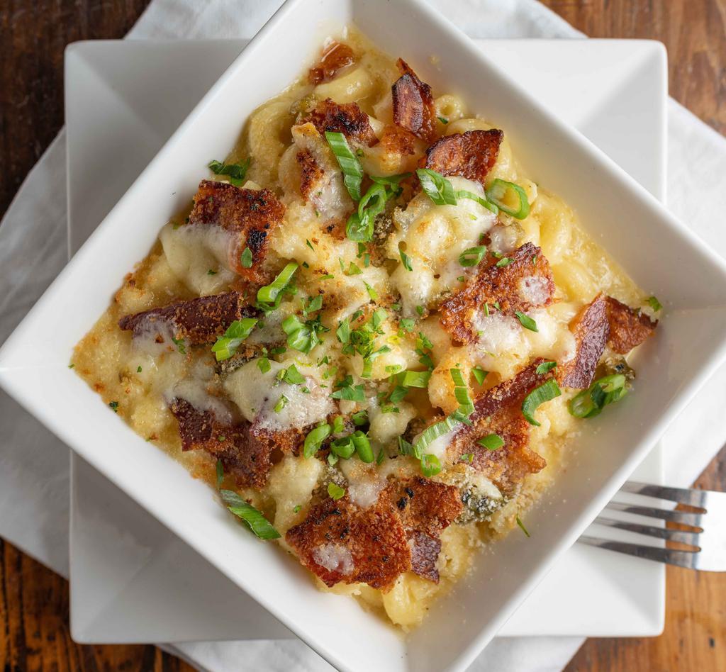 Starboard Mac & Cheese · House blend cheese sauce with Anaheim peppers topped with BBQ, bacon, and bread crumbs .