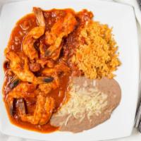 Endiablados Shrimp · Medium hot chipotle sauce and bacon. Served with rice, beans and tortillas.