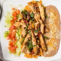 Chicken Fajita Platter · Grilled chicken breast with onions, bell peppers and Lulu's special seasoning. Served with r...