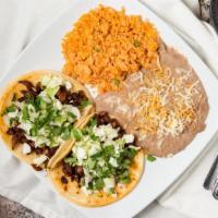 Two Super Tacos · Served with rice and beans.