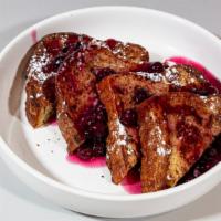 Blueberry Toast · Gourmet French toast w/ our gourmet blueberry Sauce topped w/ powdered sugar.