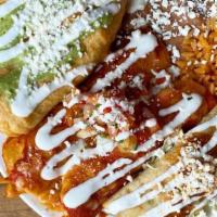 Chile Relleno Combo (Online) · One chile relleno, two chicken enchiladas, and one crispy corn quesadilla, topped with red e...