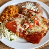 Beef Enchiladas (Online) · Corn tortillas, filled with shredded beef, smothered in red enchilada sauce, topped with our...