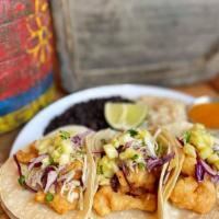 Crispy Shrimp Tacos (Online) · Deep-fried shrimp, corn tortillas, cabbage, cucumber, radishes, pineapple, mango-chipotle dr...