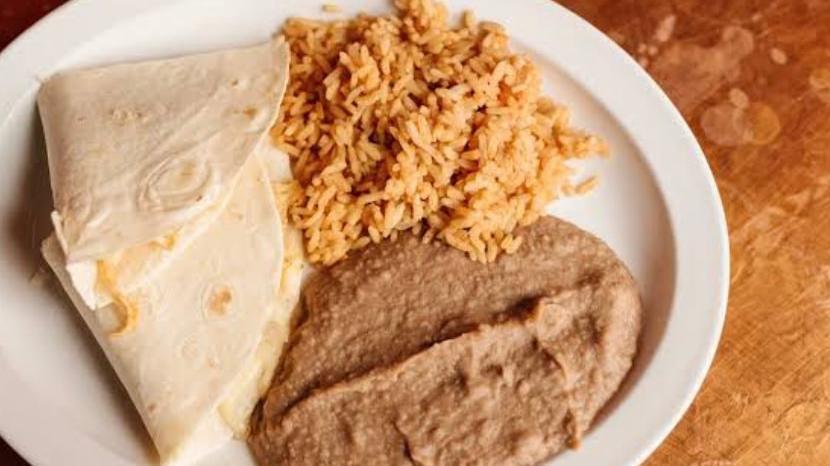 Kids Quesadilla (Online) · Small flour tortilla, with cheese and/or chicken, served with a side of red rice and refried beans.