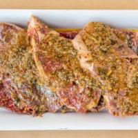 Sherry Caper Beef · 1 lb. House-Made. Beef marinated in sherry vinegar, capers, shallot, parsley, anchovy, spice...