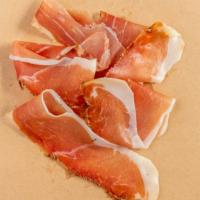 Jamon Serrano · 1/4 lb. Fermin, SP. Dry cured pork leg From Spain. Much drier and a touch saltier than the I...