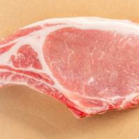 Rib Loin Chop · 12-14 oz. Pure country farms. Pasture raised, finished with a diet of hazelnuts makes this p...