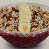 Tropical Sunrise · Acaí, Mango, Pineapple and Strawberry. Topped with Granola, Banana, Goji Berries and Coconut.