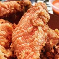 Korean Fried Chicken Wings · Seasoned and deep fried wings (4)
