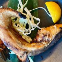 Yellowtail Collar · Grilled juicy collar, broiled and served with radish and homemade ponzu sauce.