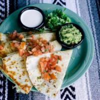 Quesadilla · A large flour tortilla filled with your choice of meat or veggies and melted Jack cheese. Se...