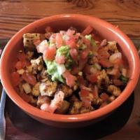 Burrito-Pollo Asado · marinated pollo asado  with guacamole and salsa fresca wrapped in a flour tortilla;
make as ...