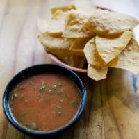 Salsa Casa (Pint) · Our house-made salsa is made with Roma tomatoes, garlic cloves, serranos, cilantro, green on...