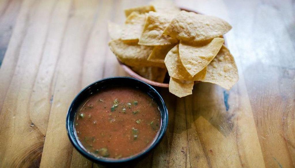 Salsa Casa (Pint) · Our house-made salsa is made with Roma tomatoes, garlic cloves, serranos, cilantro, green onions, salt, black pepper, garlic powder, and water.