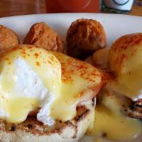 Classic Benedict · wolferman's english muffin, canadian bacon, poached eggs, hollandaise, with bacon tots or fr...